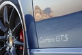 Porsche 997 Carrera GTS Cabriolet bleu logo porte