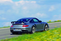 Porsche 997 GT2 RS gris 3/4 arrière droit filé penché