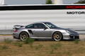 Porsche 997 GT2 RS gris 3/4 avant droit filé