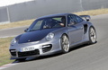 Porsche 997 GT2 RS gris 3/4 avant gauche filé penché