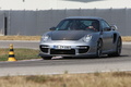 Porsche 997 GT2 RS gris 3/4 avant gauche filé