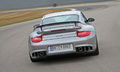 Porsche 997 GT2 RS gris face arrière travelling penché