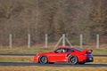 Porsche 997 GT2 RS rouge 3/4 arrière gauche filé 2