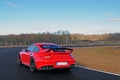Porsche 997 GT2 RS rouge 3/4 arrière gauche travelling 4