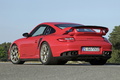 Porsche 997 GT2 RS rouge 3/4 arrière gauche 