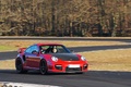 Porsche 997 GT2 RS rouge 3/4 avant droit filé 2