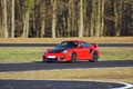 Porsche 997 GT2 RS rouge 3/4 avant gauche filé