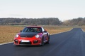 Porsche 997 GT2 RS rouge 3/4 avant gauche travelling 3