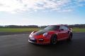 Porsche 997 GT2 RS rouge 3/4 avant gauche travelling 4
