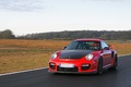 Porsche 997 GT2 RS rouge 3/4 avant gauche travelling