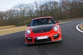 Porsche 997 GT2 RS rouge face avant travelling penché 2