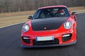 Porsche 997 GT2 RS rouge face avant travelling penché 3