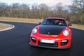 Porsche 997 GT2 RS rouge face avant travelling penché