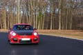 Porsche 997 GT2 RS rouge face avant travelling