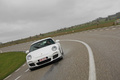 Porsche 997 GT3 MkII blanc face avant travelling penché