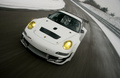 Porsche 997 GT3 RSR blanc face avant travelling penché