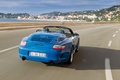 Porsche 997 Speedster bleu 3/4 arrière droit travelling penché