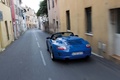 Porsche 997 Speedster bleu 3/4 arrière gauche travelling penché