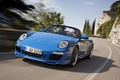 Porsche 997 Speedster bleu 3/4 avant gauche travelling penché