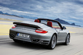 Porsche 997 Turbo Cabriolet MkII anthracite 3/4 arrière droit travelling penché