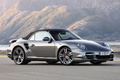 Porsche 997 Turbo Cabriolet MkII anthracite 3/4 avant droit capotée