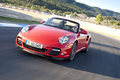 Porsche 997 Turbo Cabriolet MkII rouge 3/4 avant gauche travelling penché 2