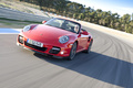 Porsche 997 Turbo Cabriolet MkII rouge 3/4 avant gauche travelling penché 3