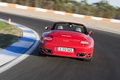 Porsche 997 Turbo Cabriolet MkII rouge face arrière travelling