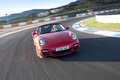 Porsche 997 Turbo Cabriolet MkII rouge face avant travelling penché