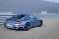 Porsche 997 Turbo S bleu 3/4 arrière droit travelling