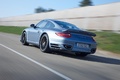 Porsche 997 Turbo S bleu 3/4 arrière gauche travelling penché 4