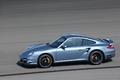 Porsche 997 Turbo S bleu 3/4 avant gauche filé penché vue de haut