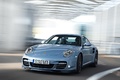 Porsche 997 Turbo S bleu 3/4 avant gauche travelling penché 3