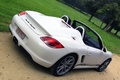 Porsche Boxster Spyder blanc 3/4 arrière droit penché