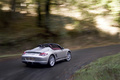 Porsche Boxster Spyder gris 3/4 arrière droit travelling