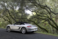 Porsche Boxster Spyder gris 3/4 arrière gauche capoté