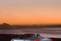 Porsche Boxster Spyder gris 3/4 arrière gauche debout
