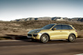 Porsche Cayenne S jaune 3/4 avant gauche travelling penché