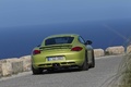Porsche Cayman R vert face arrière penché