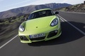 Porsche Cayman R vert face avant travelling penché