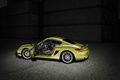 Porsche Cayman R vert profil porte ouverte