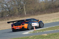 Lamborghini Gallardo GT3 noir/orange 3/4 arrière droit penché