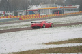 Ferrari 458 GTC rouge 3/4 arrière droit penché