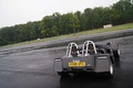 Autodrome Radical Meeting - Caterham Super 7 V8 anthracite 3/4 arrière droit penché