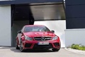 Mercedes C63 AMG Coupe rouge 3/4 avant droit