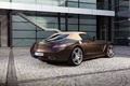 Mercedes SLS AMG Roadster marron 3/4 arrière droit capoté