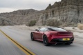 Aston Martin DBS Superleggera rouge/noir 3/4 arrière gauche travelling