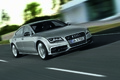 Audi S7 gris 3/4 avant droit travelling penché