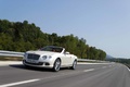 Bentley Continental GTC 2011 blanc 3/4 avant gauche travelling penché