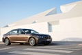 BMW 750Li MY2012 marron 3/4 avant droit